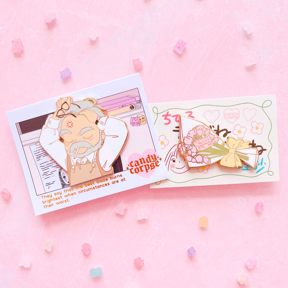 Studio Grumpy and Bouquet pins on pink background with konpeito candy